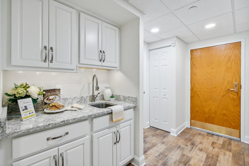 Kitchen view with brown door