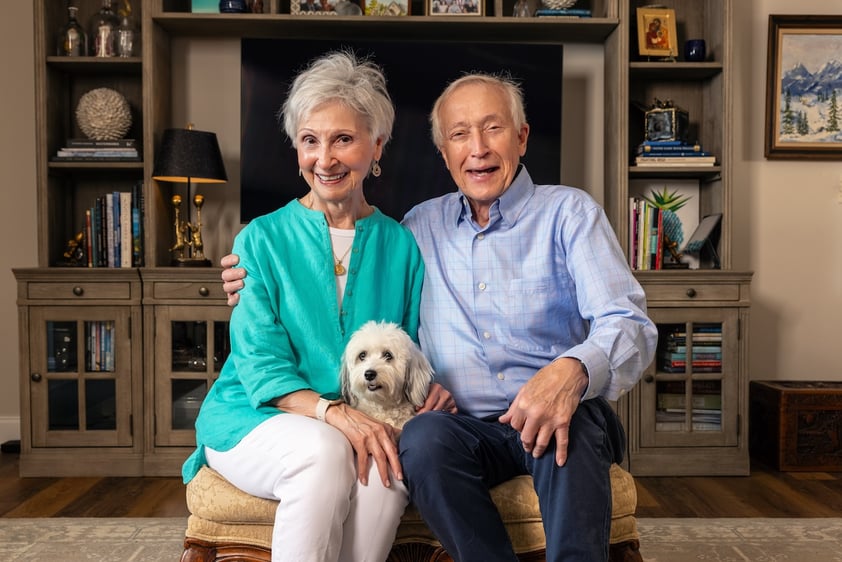 couple with their dog