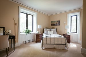 Bedroom with desk in The Cassatt Collection