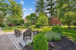 lush side patio at the Mansion