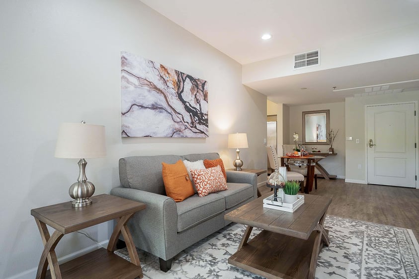 Grey couch in living room inside apartment