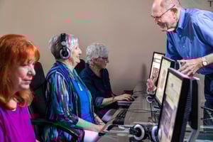 Seniors taking a computer class