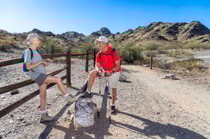 Senior couple hiking outside