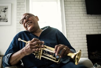 Senior man holding a trumpet