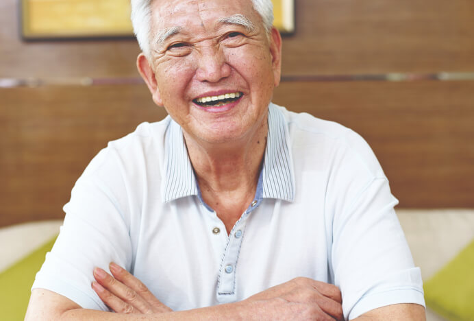 senior man smiling at the camera