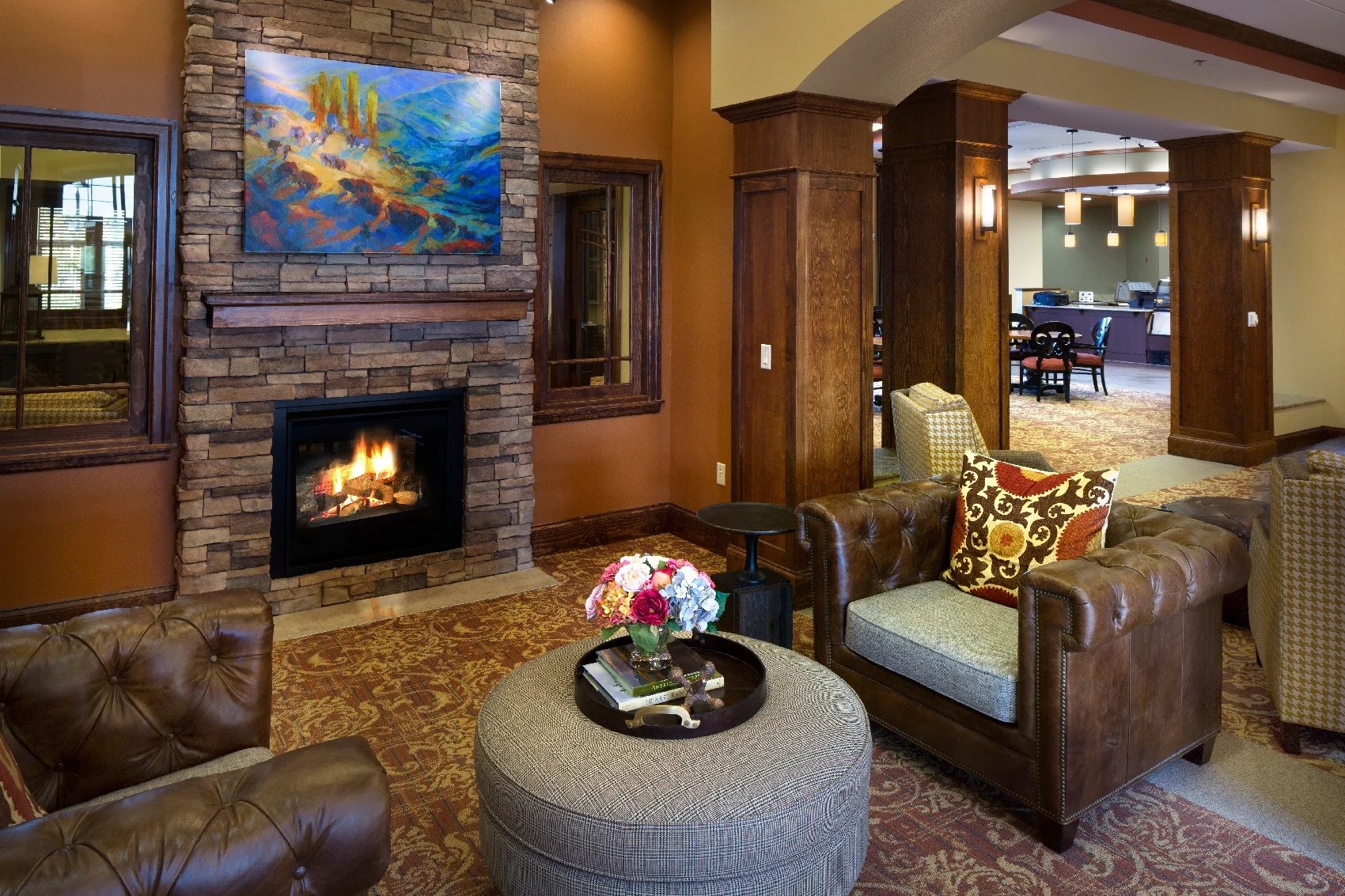 Chairs around fireplace