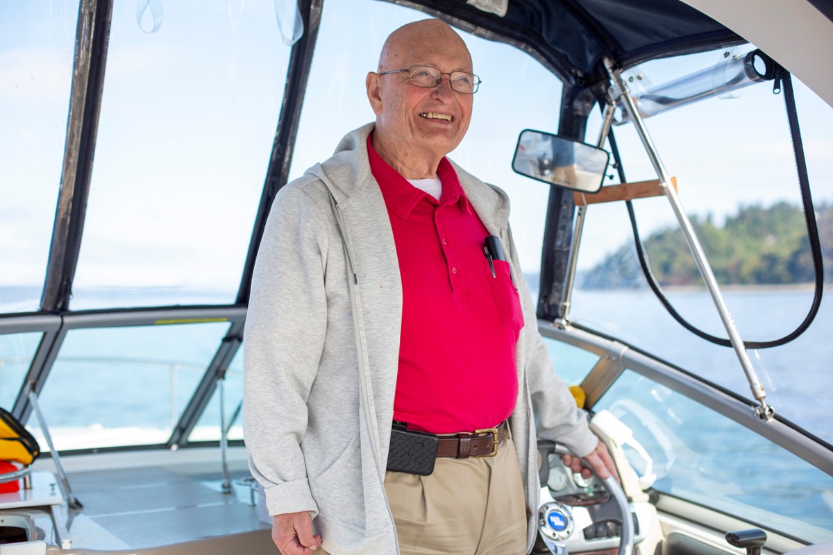 senior man on a sailboat