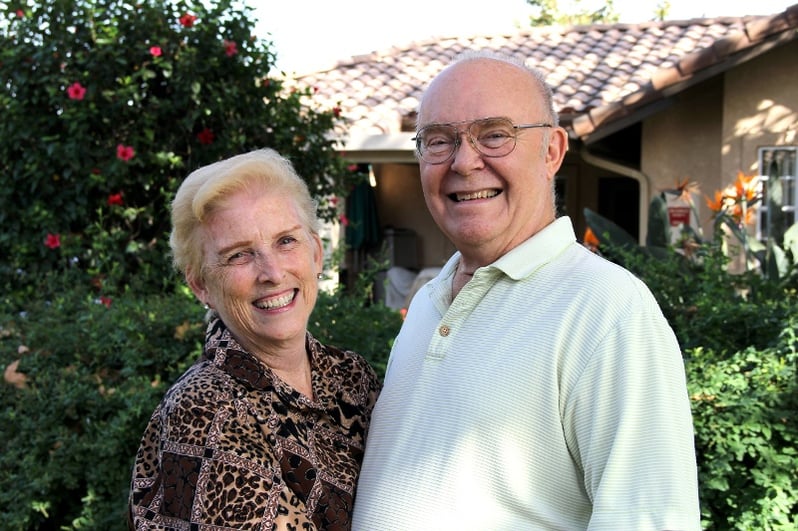 two seniors in independent living smiling