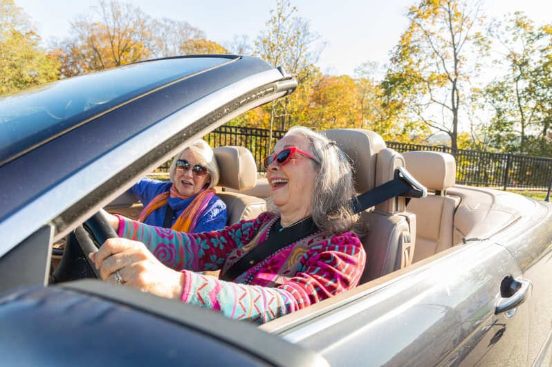 Two women in a convertible