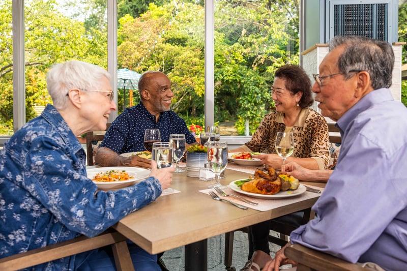 Seniors enjoying dinner at restaurant