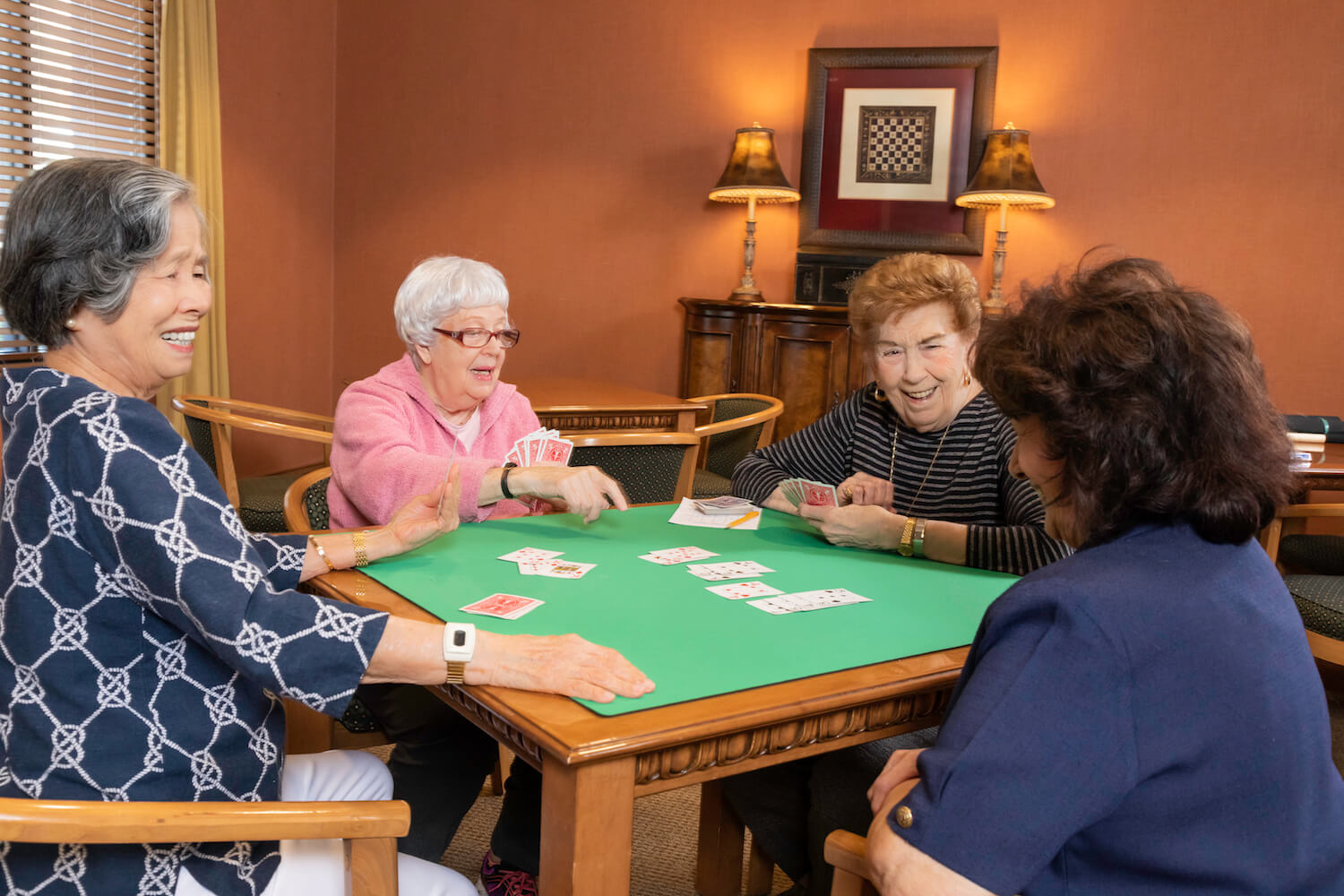 25-4 ladies playing bridge