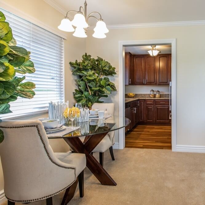 Dining area with an entrance to the kitchen