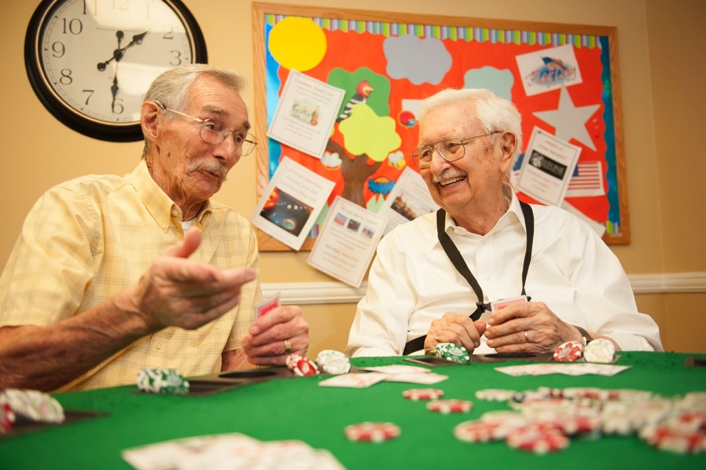 residents playing cards at community