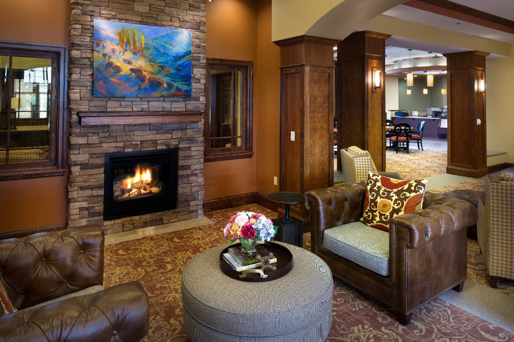 chairs around fireplace