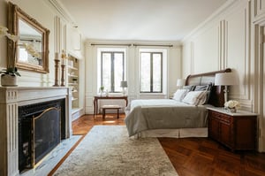 Bedroom with fireplace in The Cassatt Collection