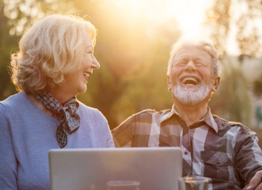 Woman and man laughing together