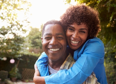 Woman hugging a man
