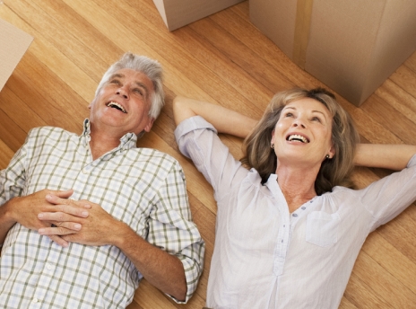 Woman and man laying on the floor