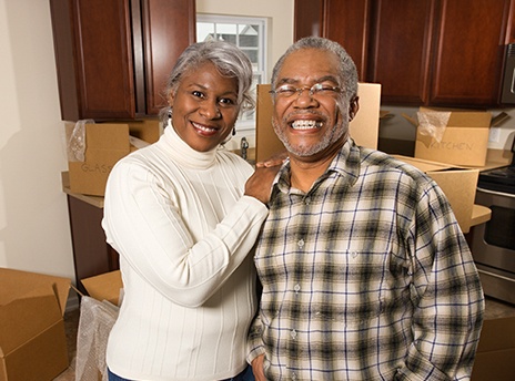 happy couple moving in
