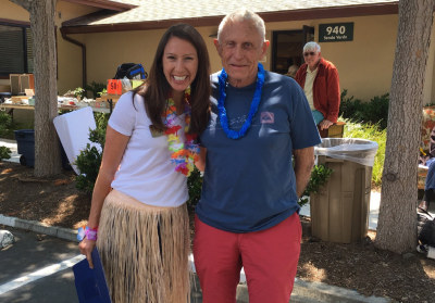 Honig and a Valle Verde resident on Team Member Luau Day.