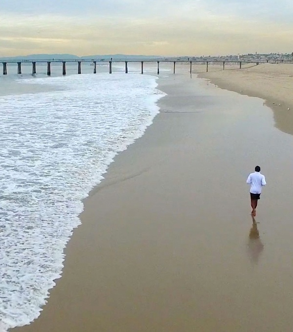 Man running on beach