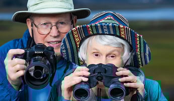 Bryce and Ann holding binoculars