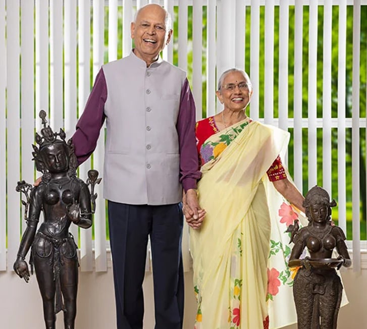 Haren and Pratima happily holding hands
