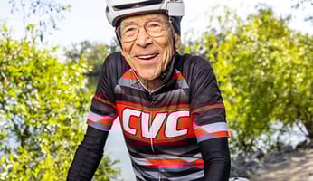 Louis wearing bike gear on his bicycle