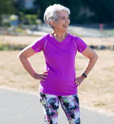 Janet in workout clothes on an outdoor path