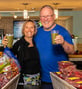 Judy and Dennis holding smoothies