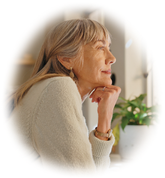 Senior woman resting her chin on her hand