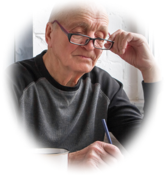 Senior man wearing glasses making a list