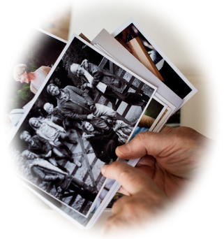 Person holding photographs