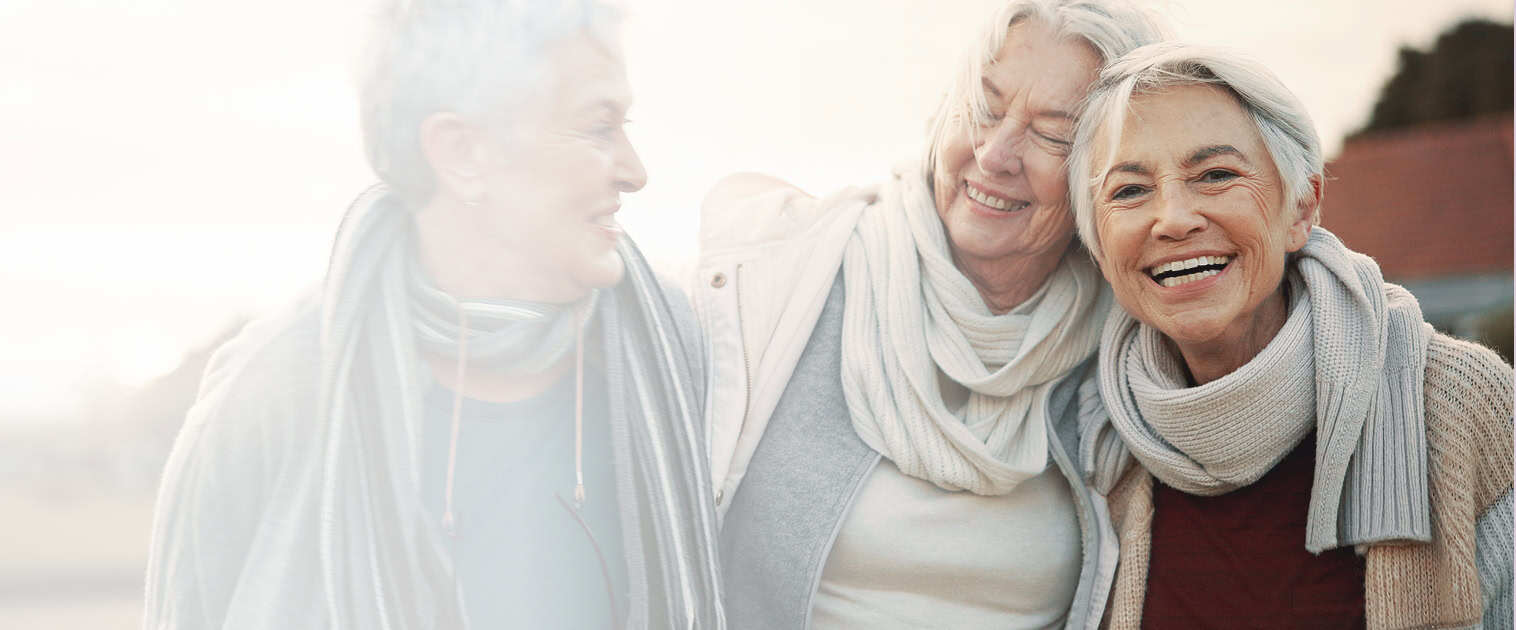 Three women standing together