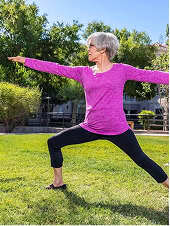 Woman doing yoga outdoors