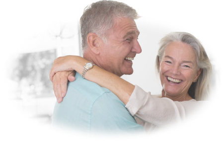 Woman with her arms around a man