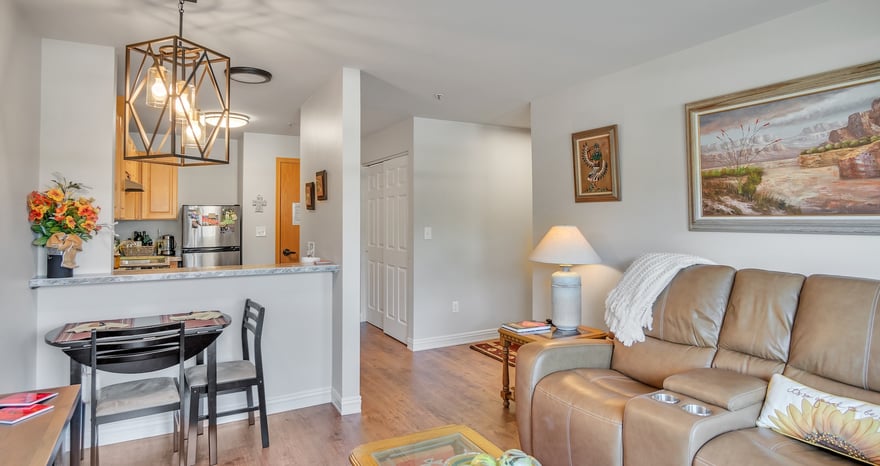 Entryway, kitchen and dining area of an apartment at The Terraces at Summitview