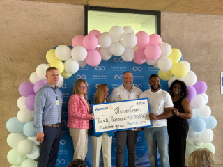 Presentation of check from Walmart to HumanGood