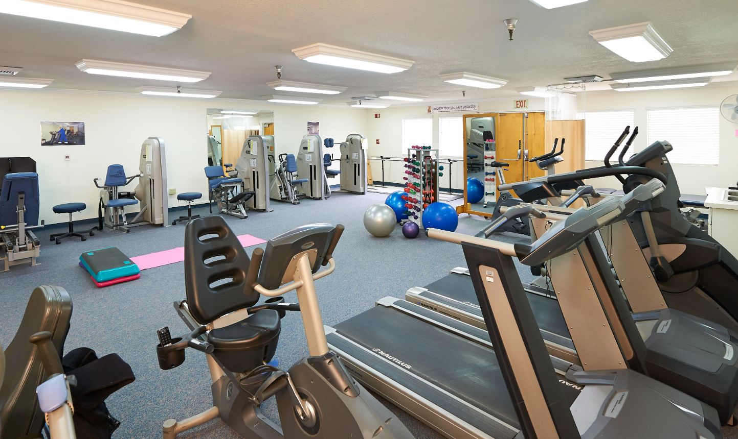 Workout room with exercise equipment