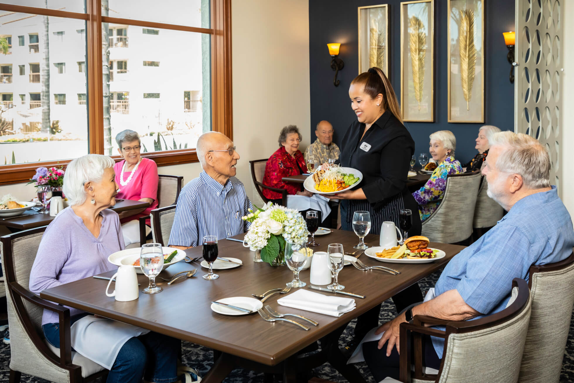 Residents in the HumanGood Regents Point dining room