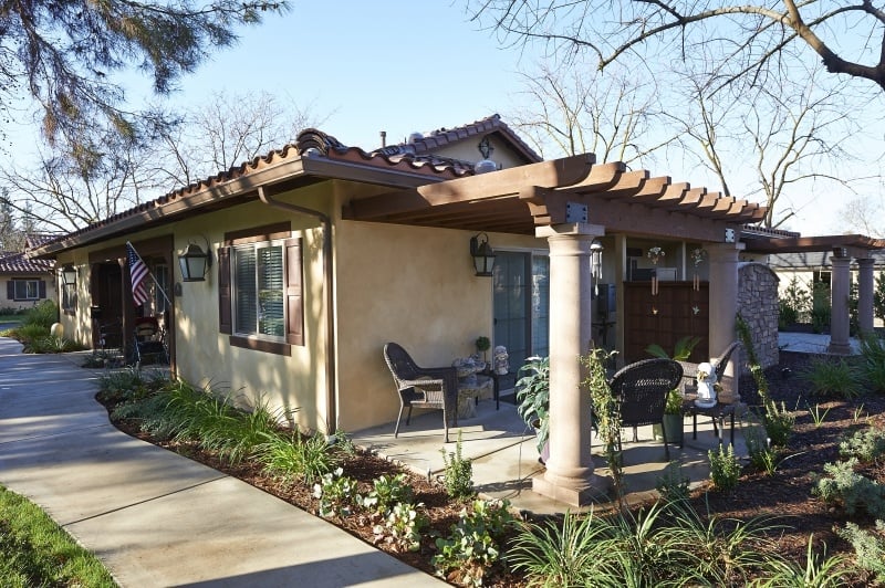 Exterior of an apartment home with a patio