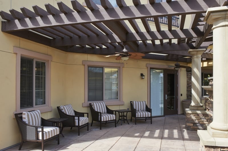 Outdoor seating area on a patio at a home at The Terraces at San Joaquin Gardens