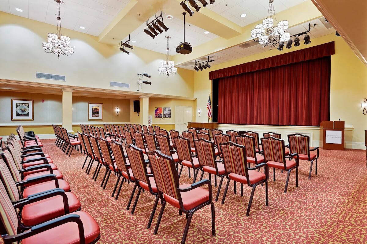 Event center with seating and a stage at The Terraces at San Joaquin Gardens