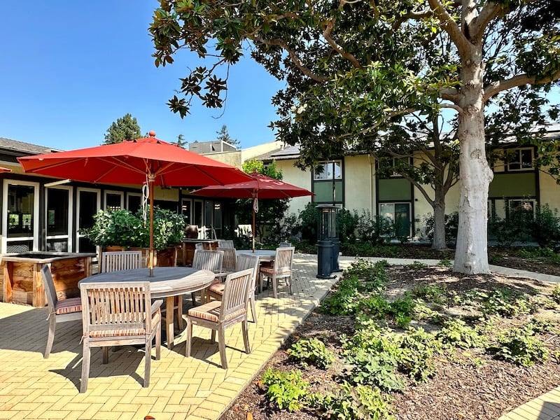 Outdoor patio with tables and chairs