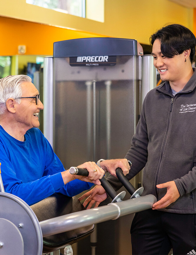 living weights with the assistance of a trainer