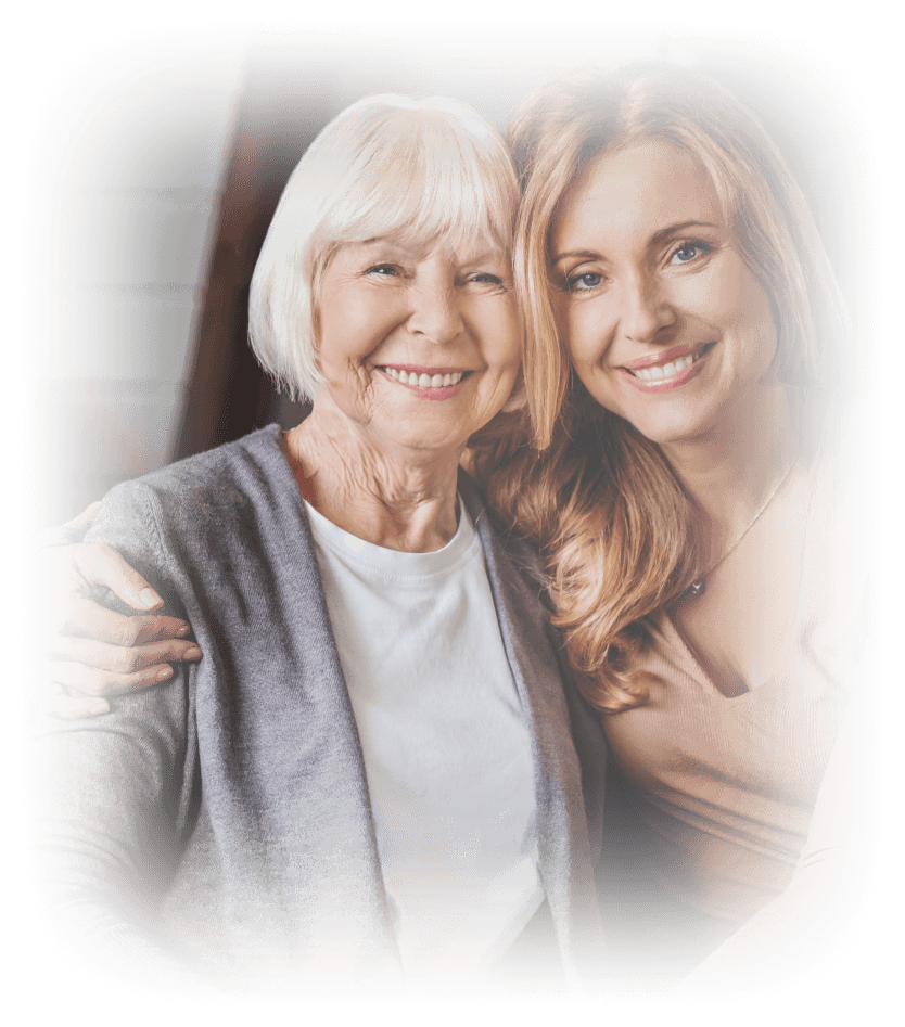 senior mother smiling with her adult daughter