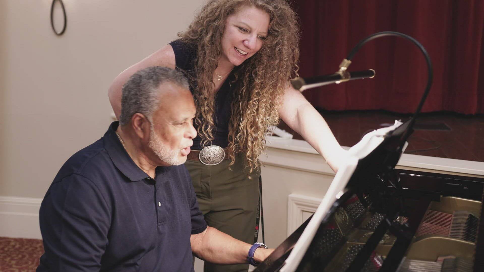 piano teacher with senior man student