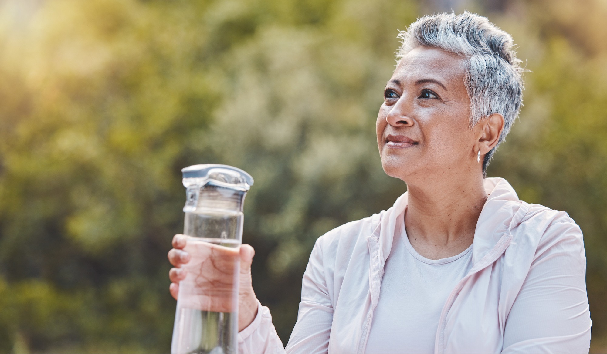 Lady holding water bottle