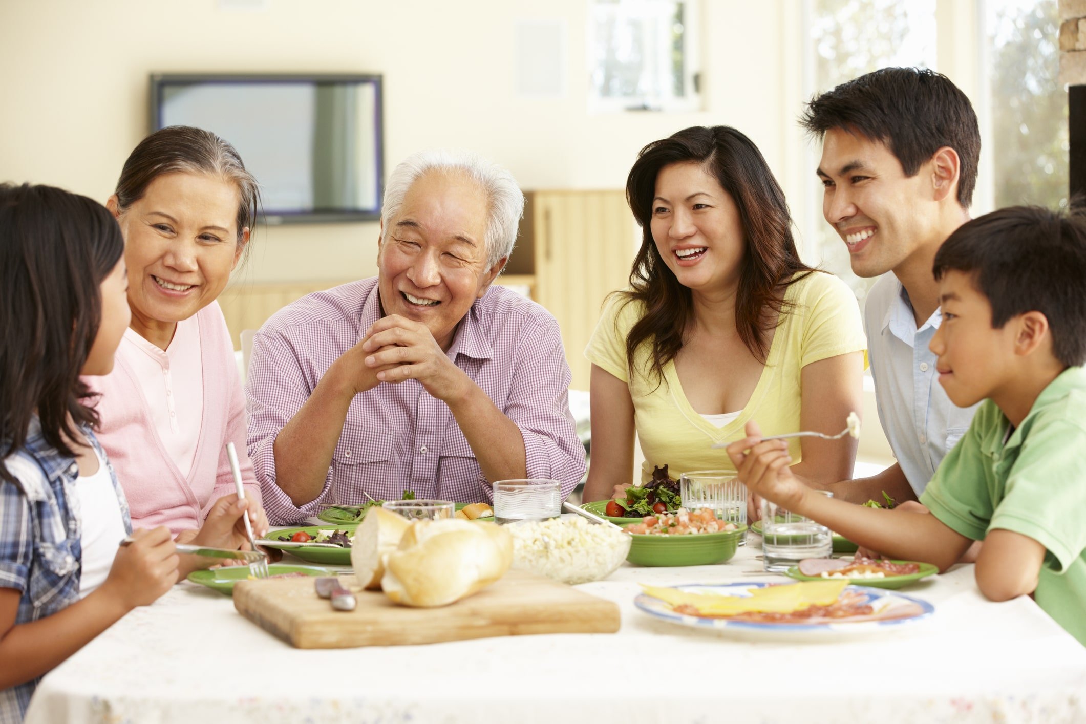 Big family enjoying a meal together