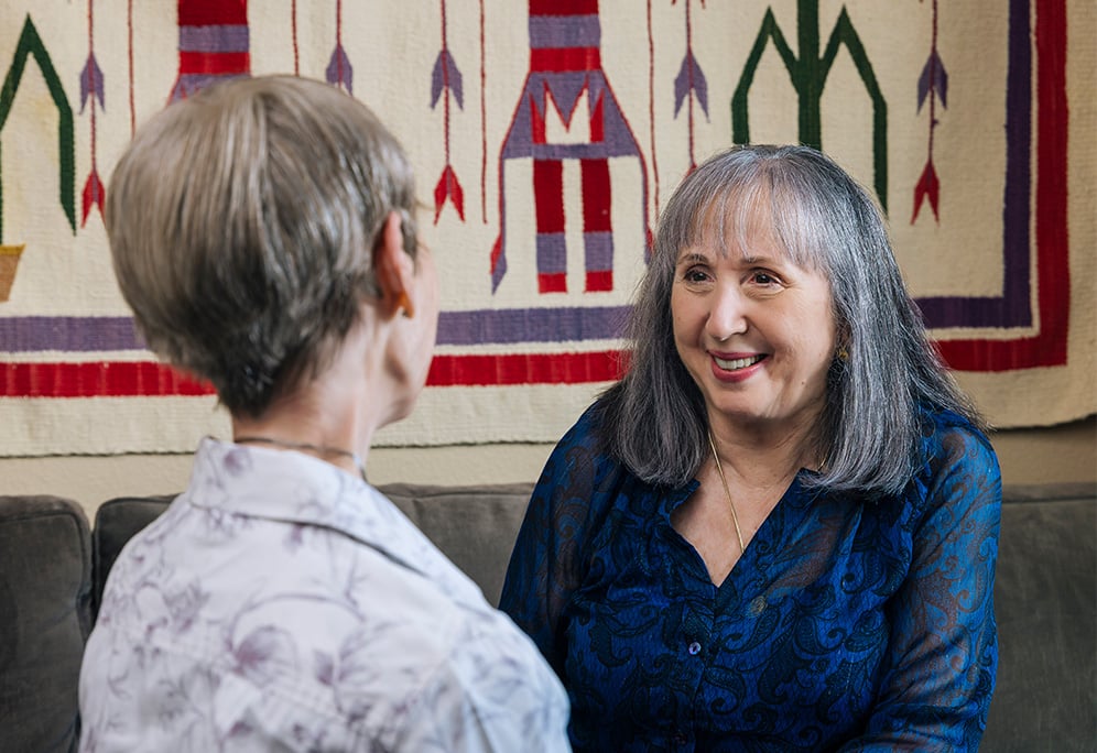 Mary having a conversation with a friend